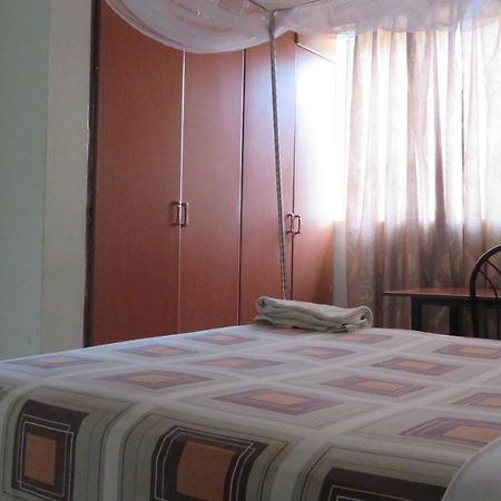 Global Village Hotel Pakwach Bagian luar foto