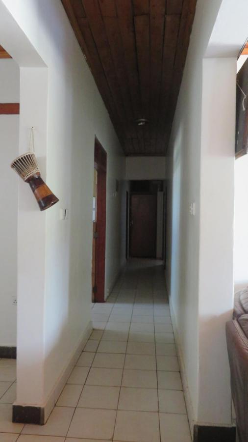Global Village Hotel Pakwach Bagian luar foto